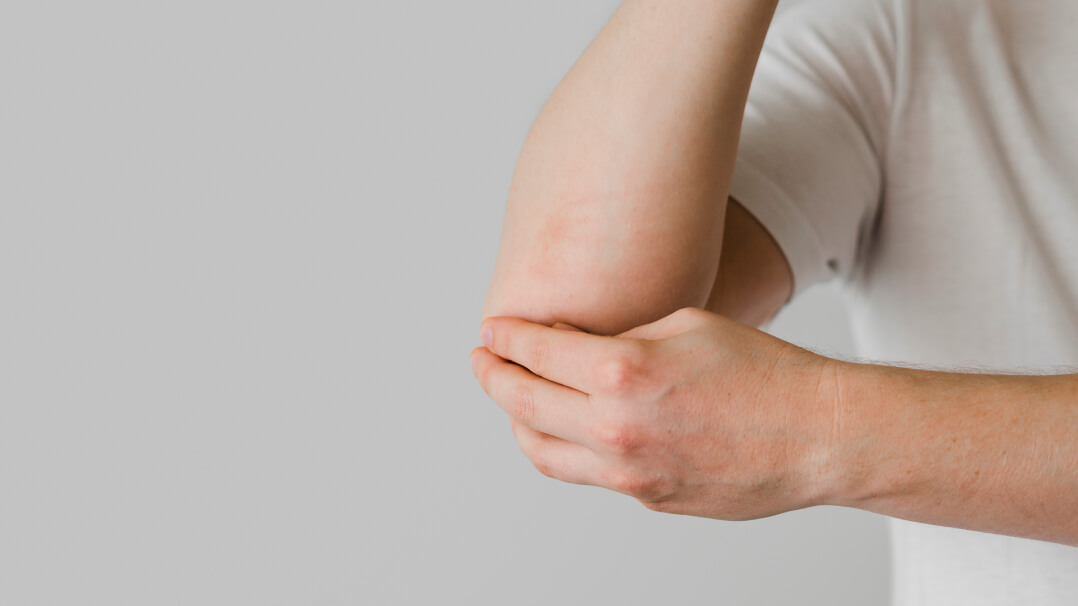 Close up patient elbow issues | elbow injury